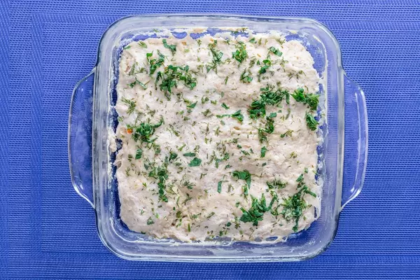 Baked meatballs with minced chicken in a glass pan