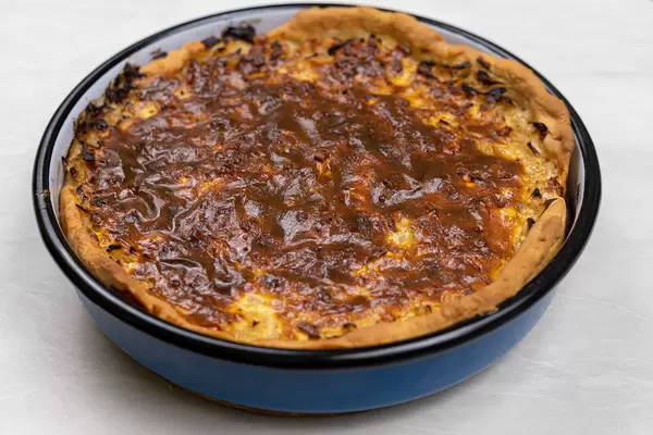 Baked Onion Pie on the round baking tray