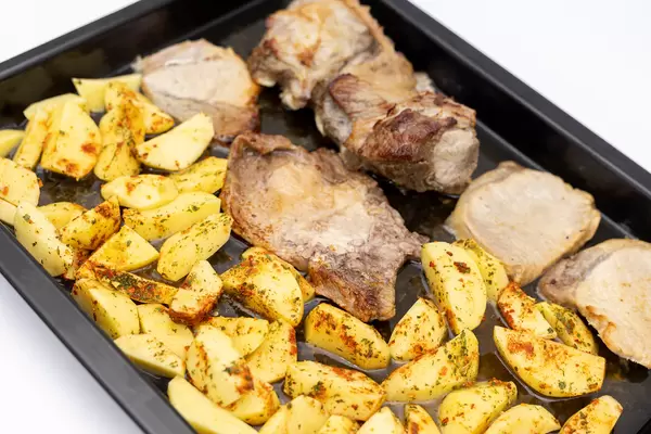 Baked Pork Ribs and Chops with Potatoes