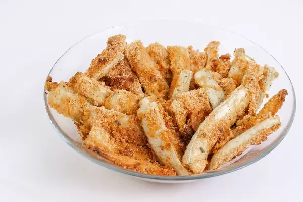 Baked Zucchini with Bread Crumbs isolated above white background
