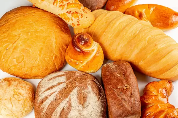 Bakery products background with breads and buns