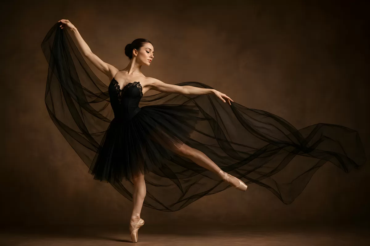 Ballerina im schwarzen Tüllkleid tanzt elegant