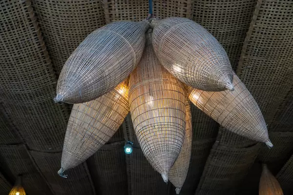 Bamboo Baskets with Light Bulbs as Ceiling Lamps and Decoration in a Restaurant in Ho Chi Minh City, Vietnam