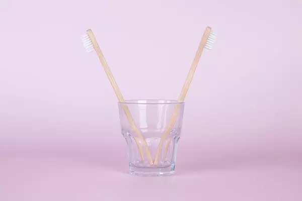 Bamboo toothbrushes in a glass (Flip 2019)