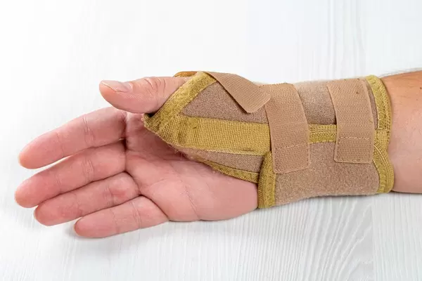 Bandage on the wrist of a man with a bruised hand (Flip 2019)