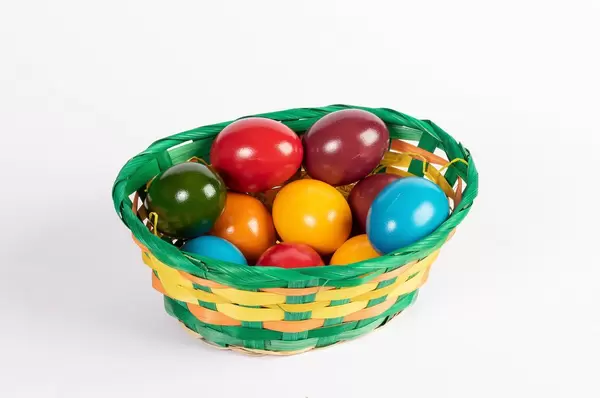 Basket full of painted Easter eggs