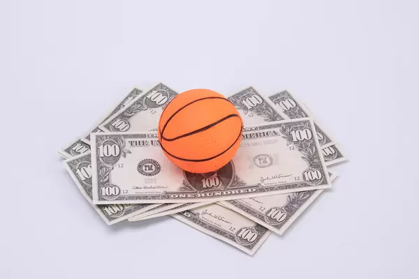 Basketball ball on US dollar banknotes