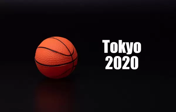 Basketball ball with Tokyo 2020 text on black background