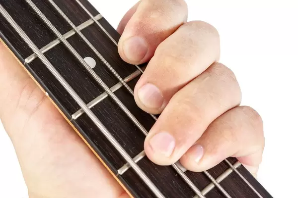 Bass Guitar Neck with Hand on the strings