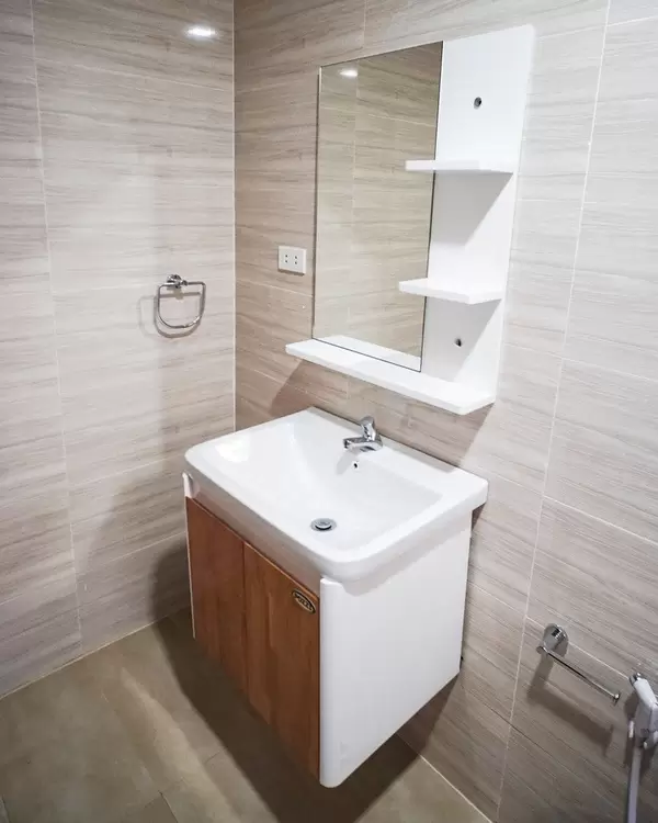 Bathroom sink with mirror and shelf