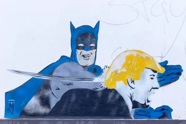 Batman slaps Donald Trump's face (graffiti)
