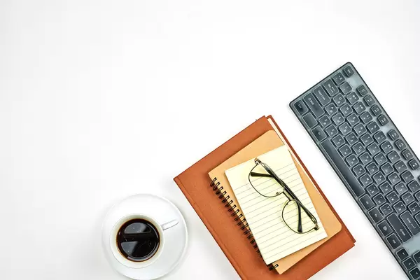 Beautiful arrangement of office supplies on white background with copy space