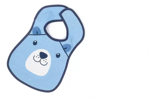 Beautiful Baby Bib above white background with copy space