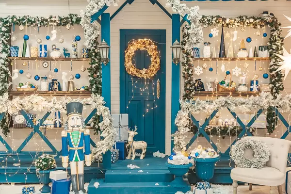 Beautiful blue and white background of decorated house for christmas