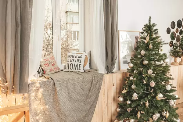 Beautiful christmas room with decorated christmas tree and window