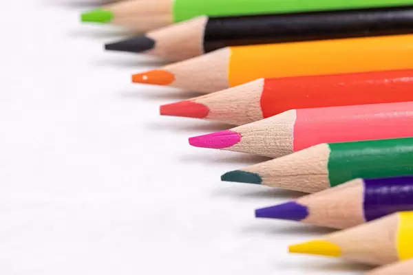 Beautiful Colorful Wooden Pencils aligned diagonal with copy space