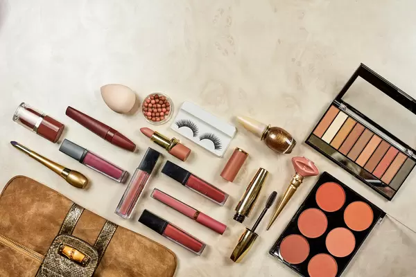 Beautiful flat-lay arrangement of beauty products and make-up tools