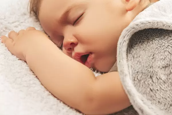 Beautiful gentle photo of a small child in a dream