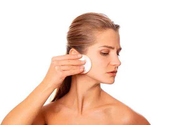 Beautiful girl takes care of her skin