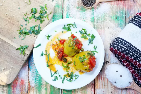 Beef and Rice Stuffed peppers, Greek cuisine. Wooden vintage background (Flip 2019)