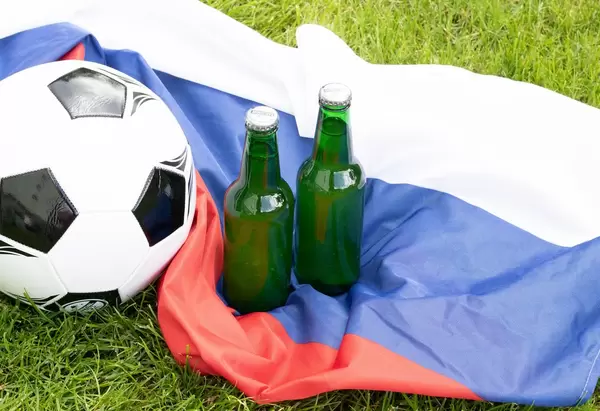 Beer bottles on Russian flag