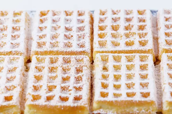 Belgian square waffles with powdered sugar