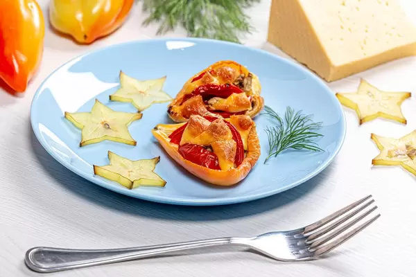 Bell peppers baked with tomatoes and cheese