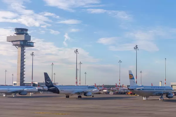 BER Airport control tower and Lufthansa (in the foreground) and Easyjet aircraft (in the background)