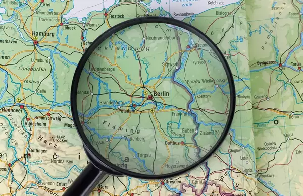 Berlin on map under a magnifying glass