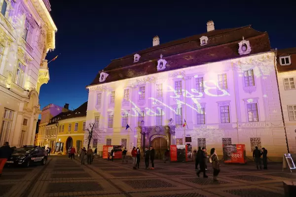 Best Wishes message, light reflection on buildings for Christmas holidays, Sibiu (Flip 2019)