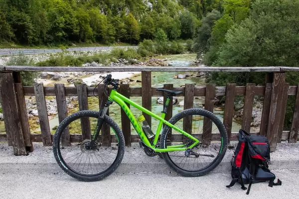 Bicycle parked on bridge