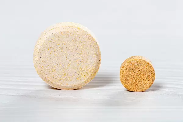 Big and small pills closeup (Flip 2019)