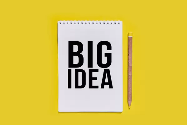 Big idea caption on the notepad