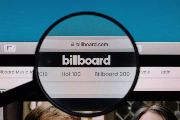 Billboard logo under magnifying glass