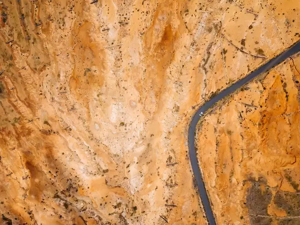 Bird eye view of a road through a wasteland / Vogelperspektive einer Straße durch ein Ödland