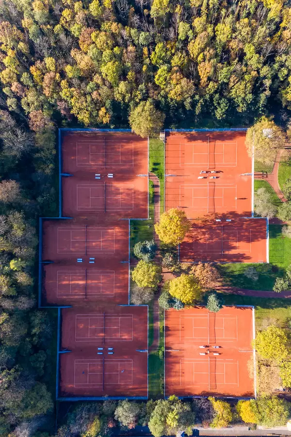 Bird View Drone Photo of Sand Tennis Courts of Marienburger Sport-Club 1920 e.V. at Forest Botanical Garden And Friedenwald in Cologne, Germany