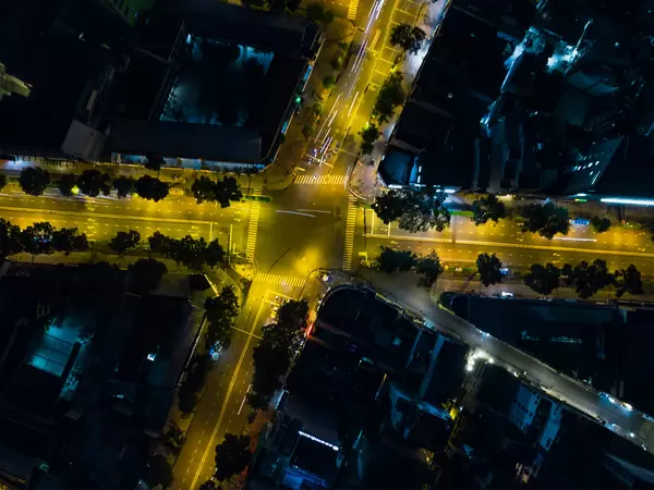 Bird View Drone Photo of the Intersection of Tran Hung Dao Street, Bui Vien Street and Nguyen Thai Hoc Street with Long Exposure Light Streaks in Ho Chi Minh City, Vietnam