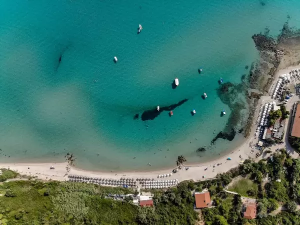 Bird's eye view of boats and the beach in Afitos