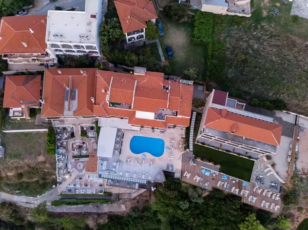 Bird's eye view of Rigas Hotel Afitos at sunset
