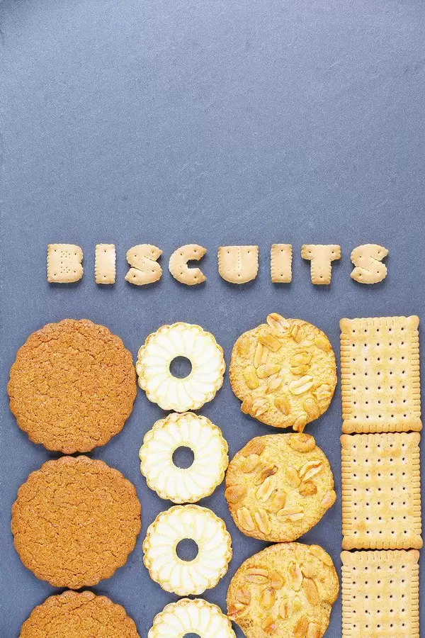Biscuit word written wth biscuit letters, dark background