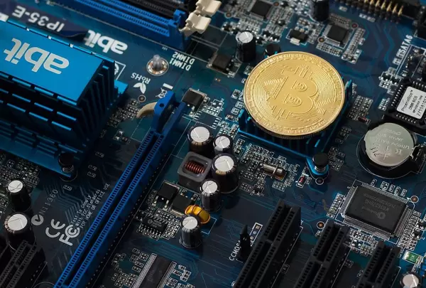 Bitcoin on a printed circuit board symbolising digital currency