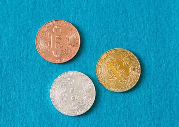Bitcoins on a blue background
