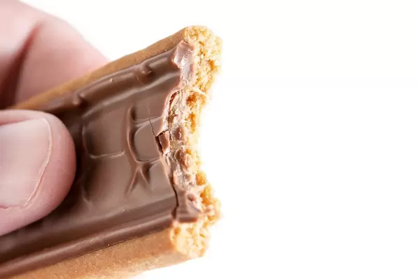 Biten Twix Top chocolate bar in the hand