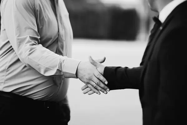 Black And White Image Of A Handshake
