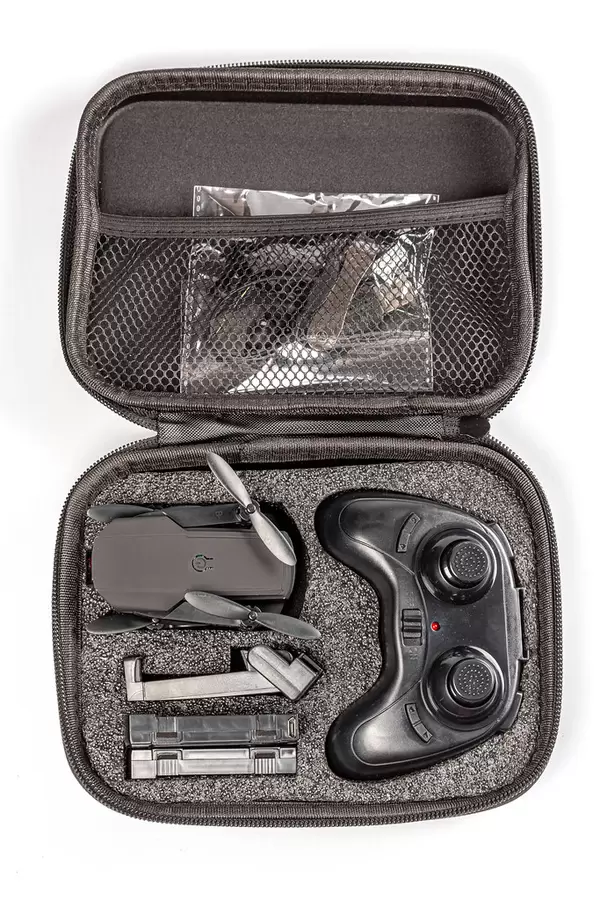 Black drone quadcopter with a remote control in case
