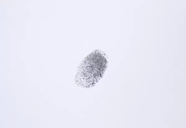 Black fingerprint on white background