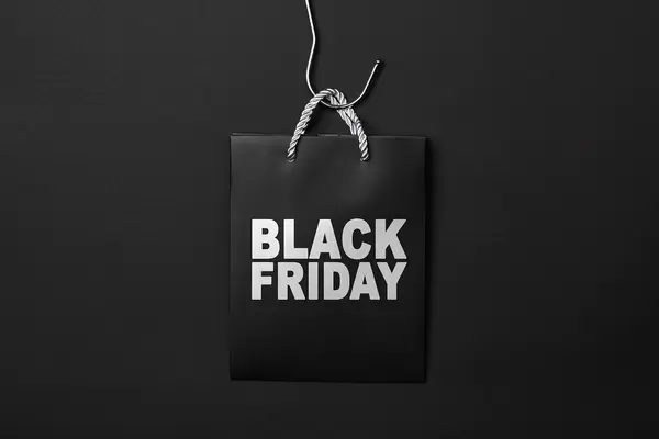 Black friday bag on dark background