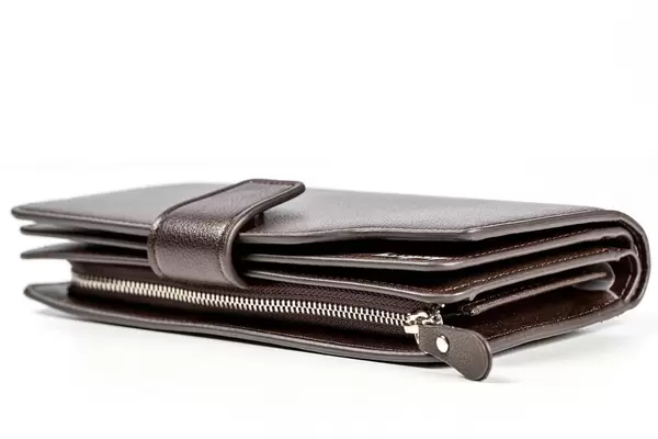 Black leather men's wallet on white background