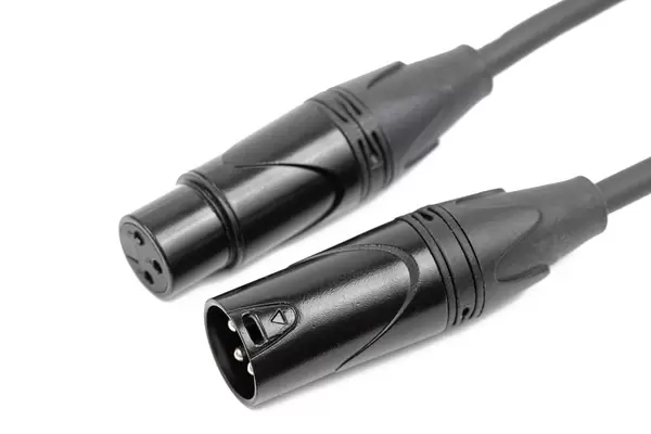 Black Microphone XLR connectors on the cables isolated above white background