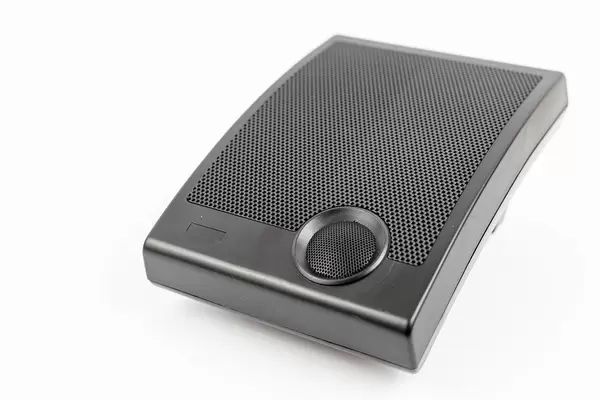 Black Plastic Speaker isolated above white background with copy space